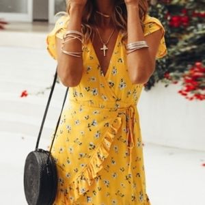Yellow wrap dress with black floral print